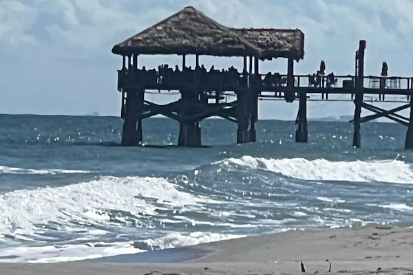 On the beach, sun-loungers, beach towels