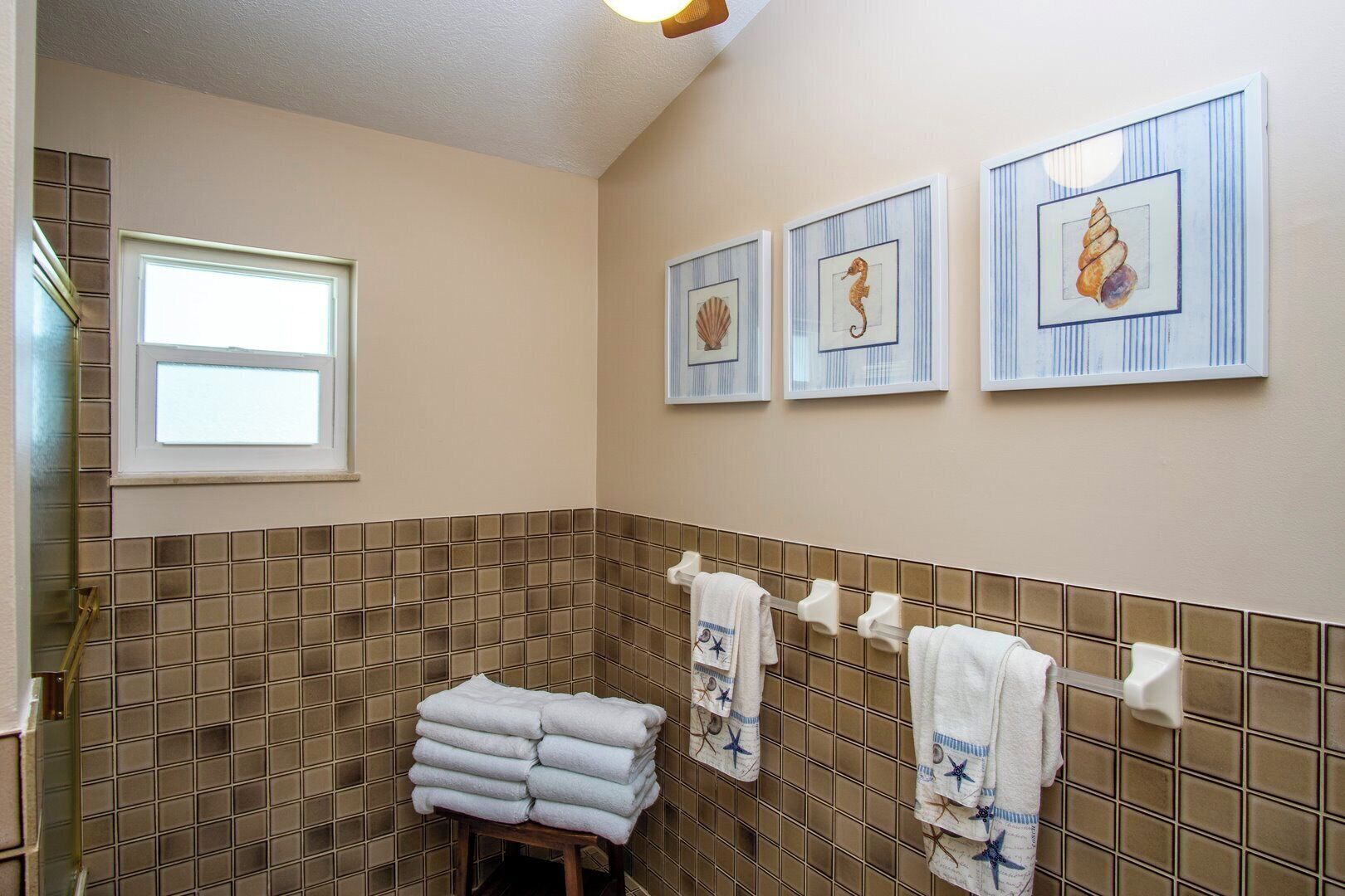 Bathtub, hair dryer, towels, soap