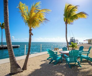 Outdoor dining - Ocean View Gem 3/2.5 Home 70` Dock Cabana Club included, and Jacuzzi on Property (Marathon)