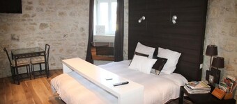 atypical cottage with heated pool and covered in a beautiful & calm