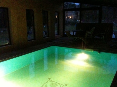 Indoor pool, a heated pool. atypical cottage with heated pool and covered in a beautiful & calm