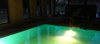 atypical cottage with heated pool and covered in a beautiful & calm