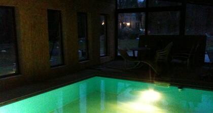 atypical cottage with heated pool and covered in a beautiful & calm