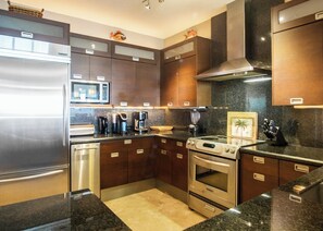 Fridge, microwave, oven, stovetop - Mariners Club # 314  3 Bed 2.5 Bath Key Largo Beachfront Luxury Ocean views and 3 bedroom 2.5 bath condo (Key Largo)
