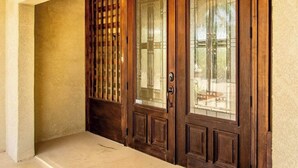 A wooden door with a glass panel, a wooden door with a glass panel, and a wooden door with a glass panel. - Beachy Keen House 3/2 Water View Pool Home with Dock (Marathon)