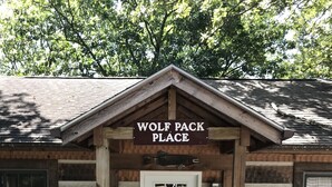A building with a sign reading "WOLF PACK PLACE". - Wolf Pack place of Pomme de Terre Lake! (Pittsburg)