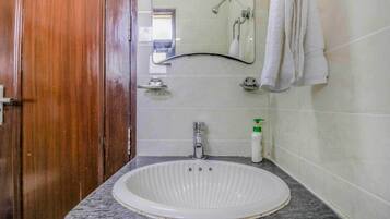 Shower, towels, soap, shampoo