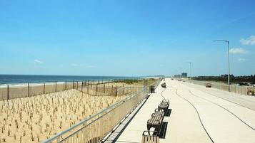 On the beach, sun loungers, beach towels
