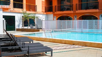 2 outdoor pools, open 7:00 AM to 9:00 PM, pool loungers