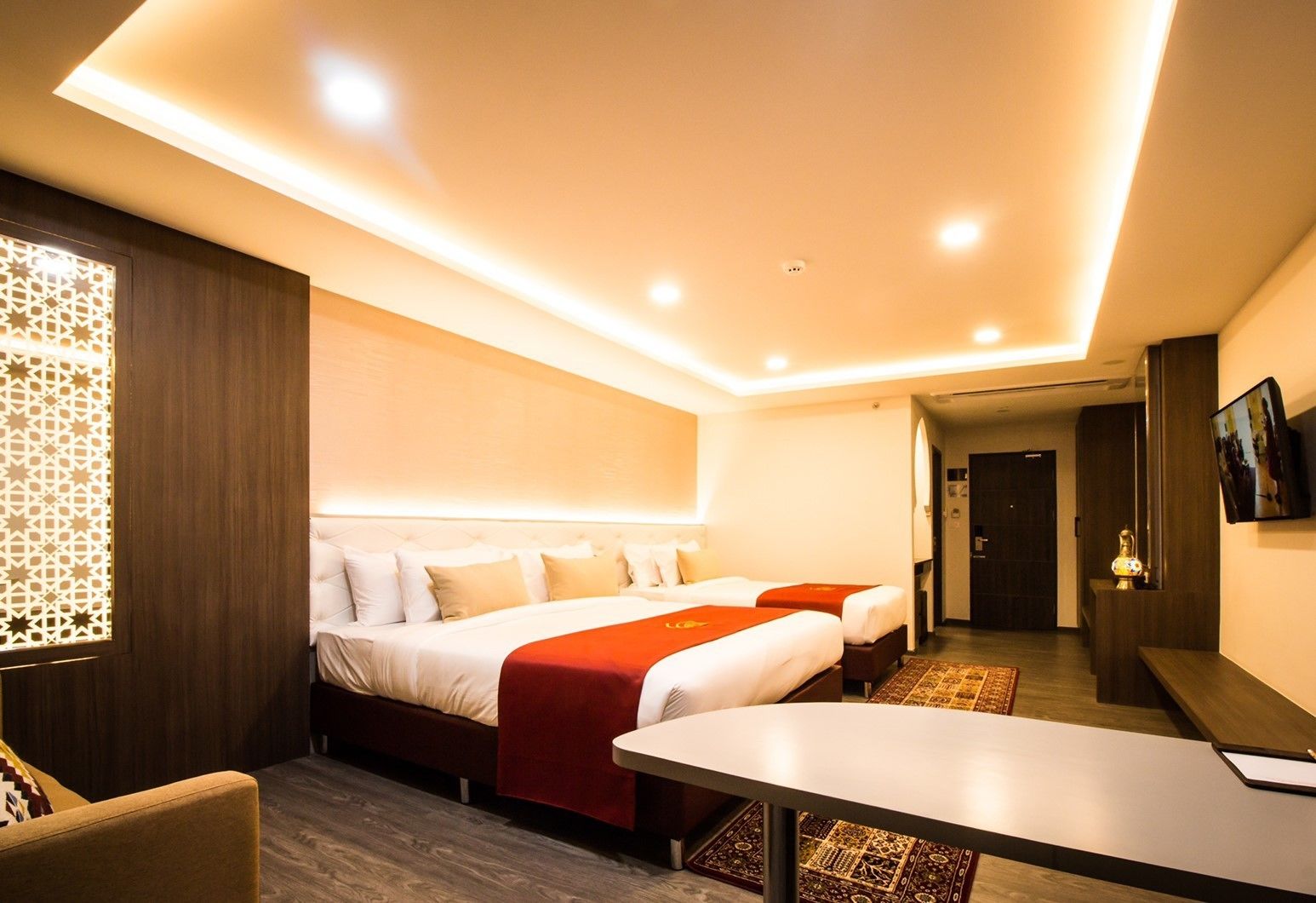 family room | 1 bedroom, minibar, in-room safe, desk