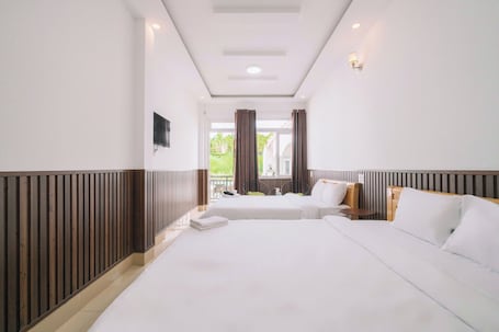 Quadruple Room with Balcony | Premium bedding, memory foam beds, individually decorated