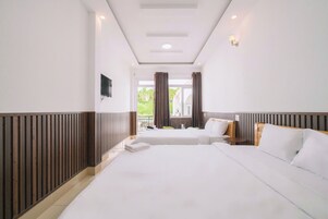 Quadruple Room with Balcony | Premium bedding, memory foam beds, individually decorated