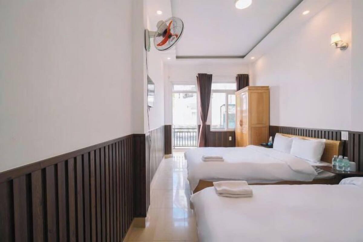 Premium bedding, memory-foam beds, desk, laptop workspace