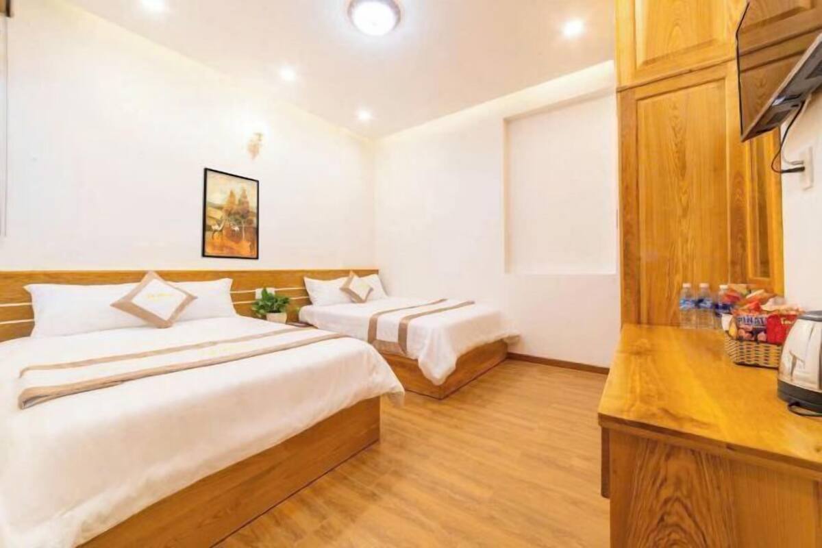 Premium bedding, memory foam beds, desk, laptop workspace