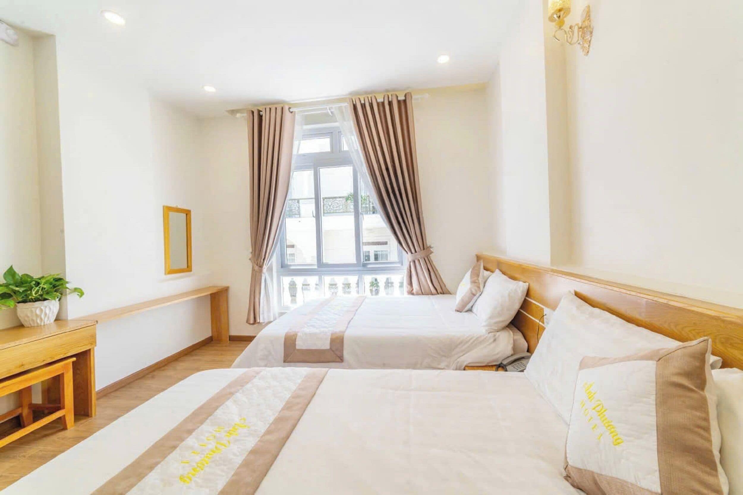 Deluxe Quadruple Room | Premium bedding, memory foam beds, desk, laptop workspace