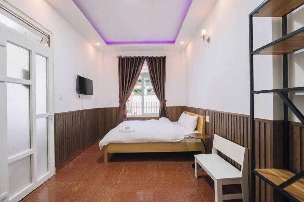 Premium bedding, memory-foam beds, desk, laptop workspace