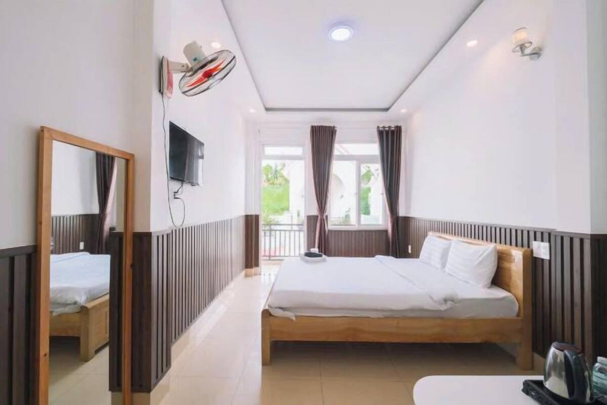 Premium bedding, memory-foam beds, desk, laptop workspace
