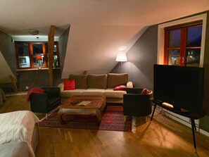 Exclusive Double Room, 1 Bedroom (C) | Living area | Flat-screen TV