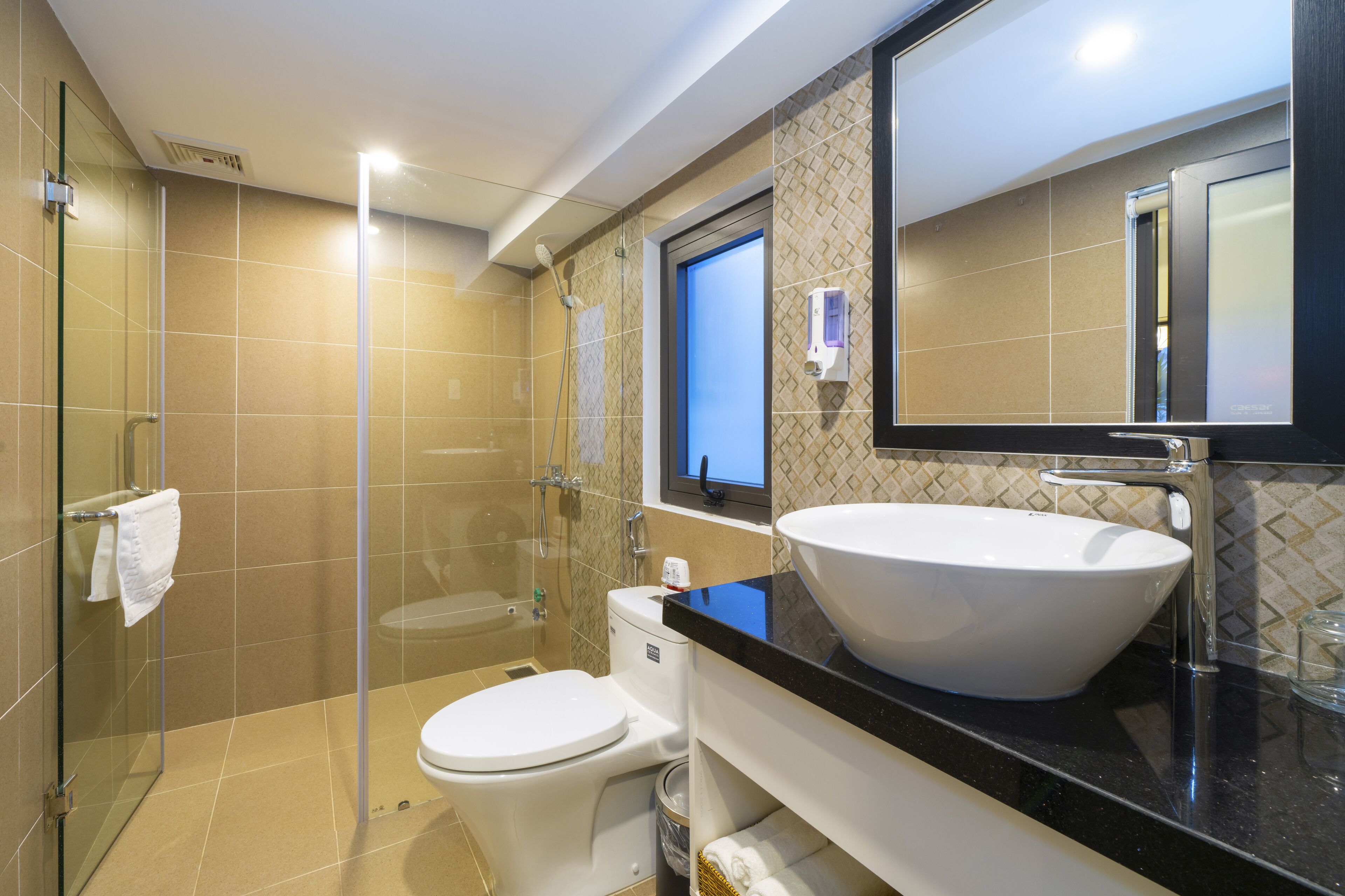 deluxe balcony with courtyard view | bathroom | shower, free toiletries, hair dryer, slippers