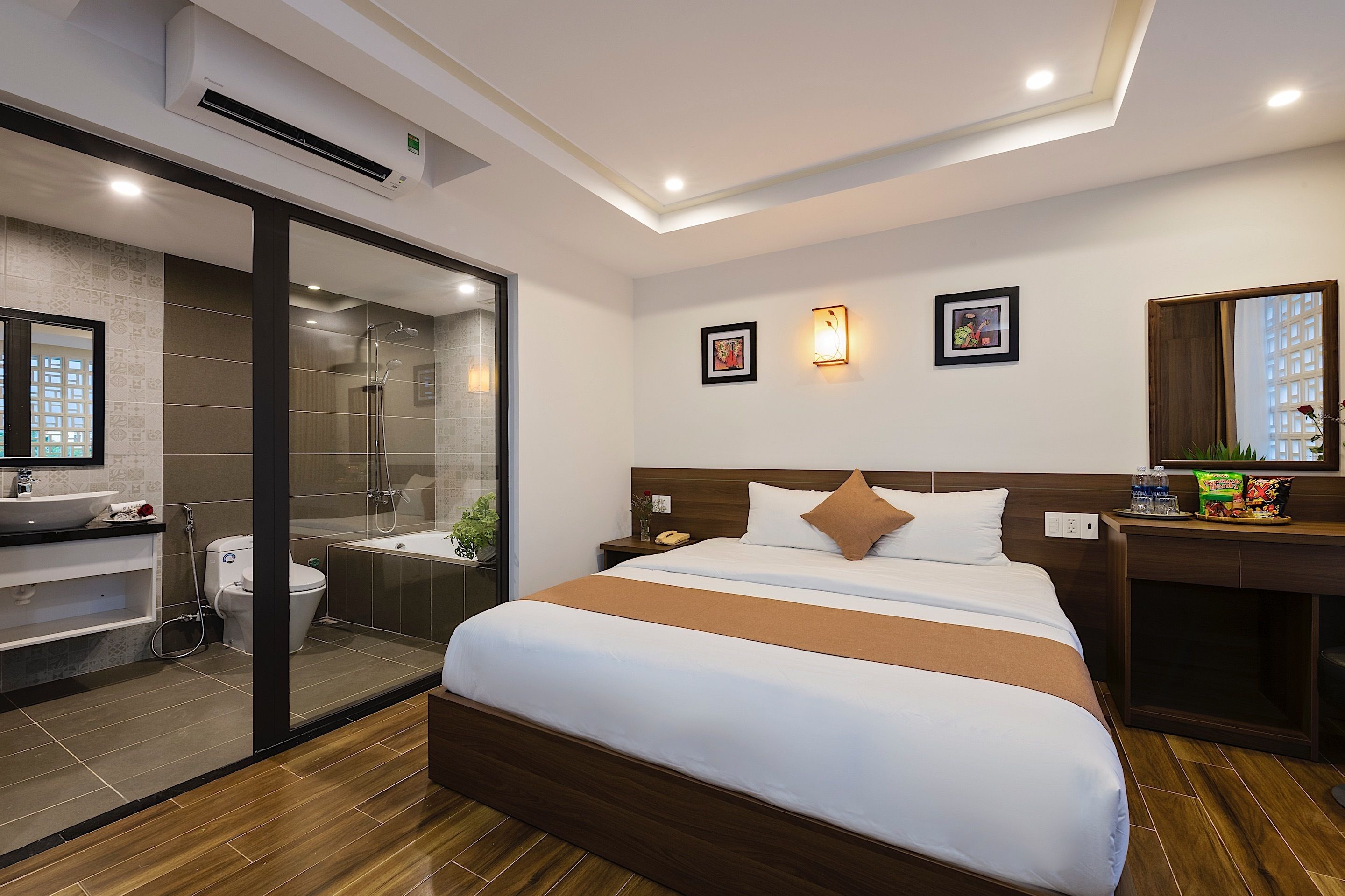 deluxe room, balcony, city view | minibar, in-room safe, desk, laptop workspace