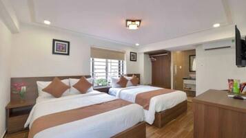 Family Balcony With Courtyard View | Minibar, in-room safe, desk, laptop workspace
