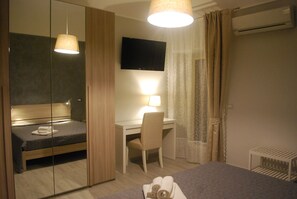 1 غرفة نوم وخزنة داخل الغرفة ومكواة/لوح كي وواي فاي