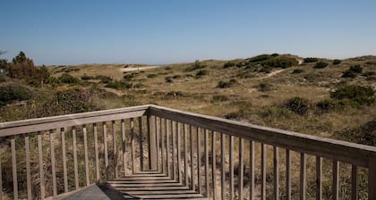 Come and stay at Chez Toni and enjoy relaxing on the deck while listening to the surf!