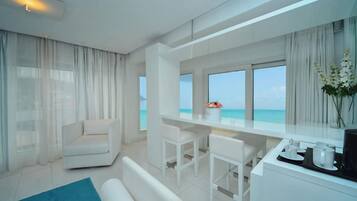 Signature Suite, 1 Bedroom | Minibar, in-room safe, desk, soundproofing