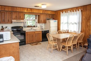 Fridge, microwave, stovetop, dishwasher - The Beach Bux cottage is located one lot back and easy access to the beach! (Frisco)