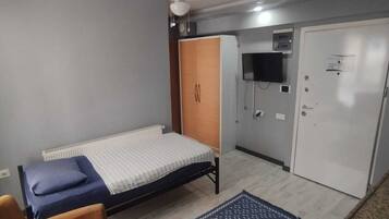 Appartement Classique, vue ville | Rideaux occultants, fer et planche à repasser, Wi-Fi gratuit