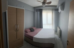 Familie vierpersoonskamer | Verduisterende gordijnen, een strijkplank/strijkijzer, gratis wifi