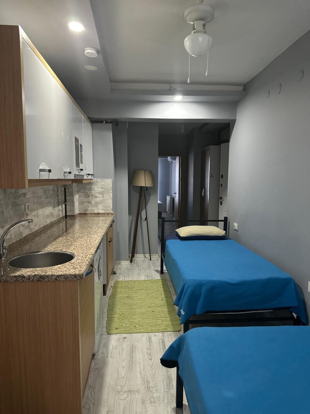 family quadruple room | living area | 82-inch lcd tv with satellite channels