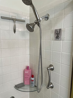 Combined shower/tub, hair dryer, towels, soap