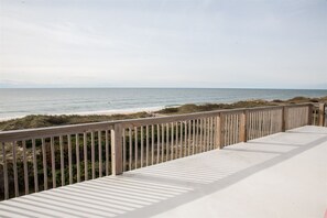 Enjoy breathtaking views of the ocean from this expansive deck overlooking the beach and dunes.