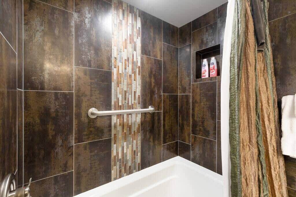 Bathtub, hair dryer, towels