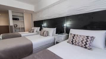 Hypo-allergenic bedding, down comforters, pillowtop beds, minibar