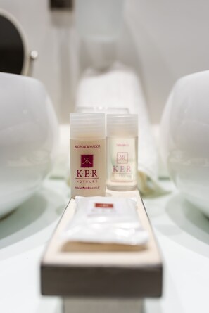 Two skincare products labeled 'KER' on a tray in a hotel setting. - Ker San Telmo Hotel (Buenos Aires)