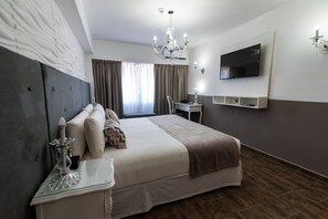 Hypo-allergenic bedding, down duvets, pillow-top beds, minibar