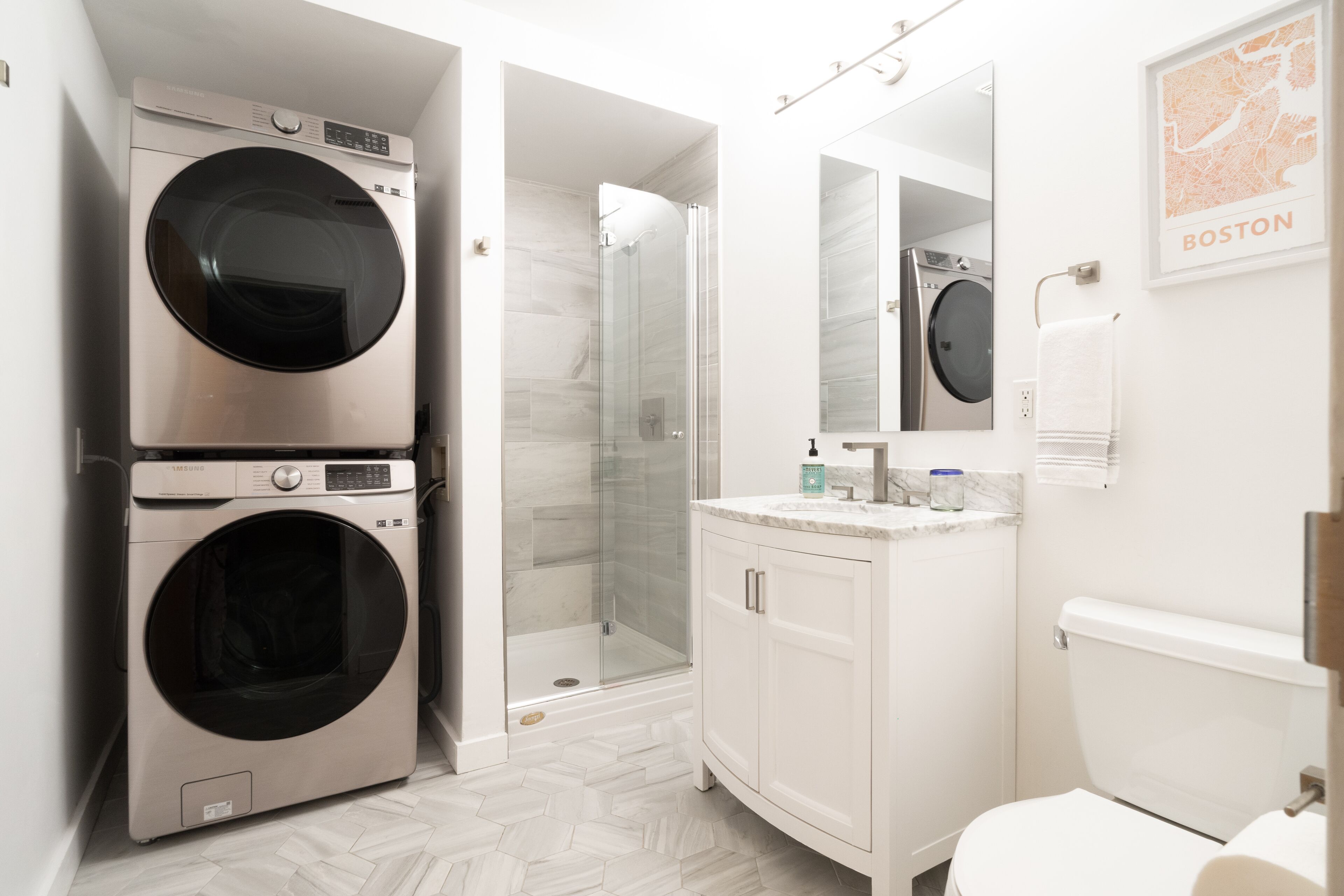 Shower, hair dryer, towels, soap