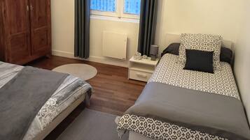 2 quartos, ferros/tábuas de passar roupa, Wi-Fi de cortesia