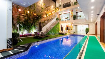 Outdoor pool, open 8:00 AM to 8:00 PM, sun loungers