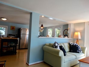 Family Room/Living Room with a view into dinning kitchen area.  