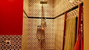 Bathtub, hair dryer, toilet paper