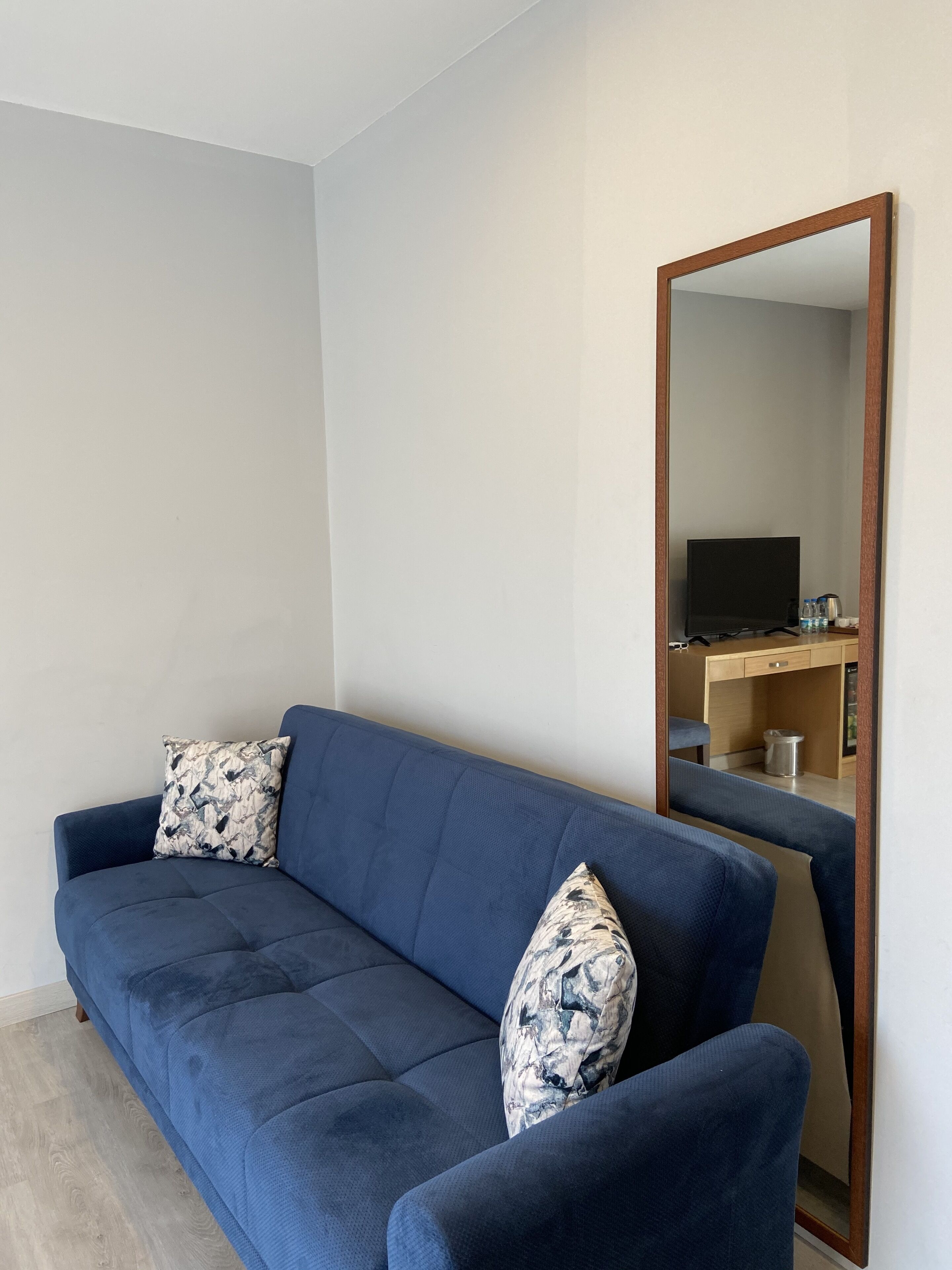 business triple room, 1 bedroom, lanai | living room | 32-inch led tv with cable channels, tv