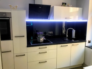 Apartment (Johannisturm) | Private kitchen | Full-size fridge, oven, stovetop, coffee/tea maker