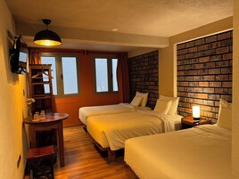 Basic Quadruple Room, Multiple Beds | Desk, laptop workspace, blackout drapes, soundproofing