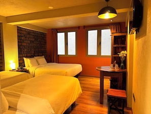 Family Quadruple Room, Multiple Beds | Desk, laptop workspace, blackout curtains, soundproofing