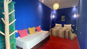 Deluxe Triple Room | In-room safe, individually decorated, individually furnished