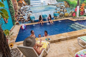 Outdoor pool, open 9:00 AM to 6:00 PM, free pool cabanas, pool umbrellas