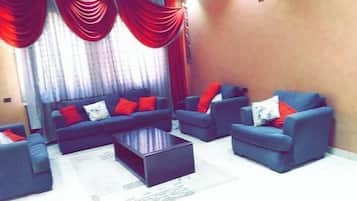 Apartment, 4 Bedrooms | Living area | 32-inch LED TV with satellite channels, TV